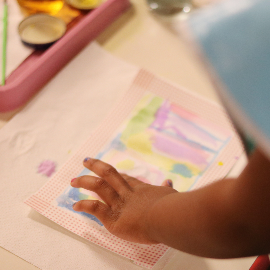 Girl making a snack with Cherrios