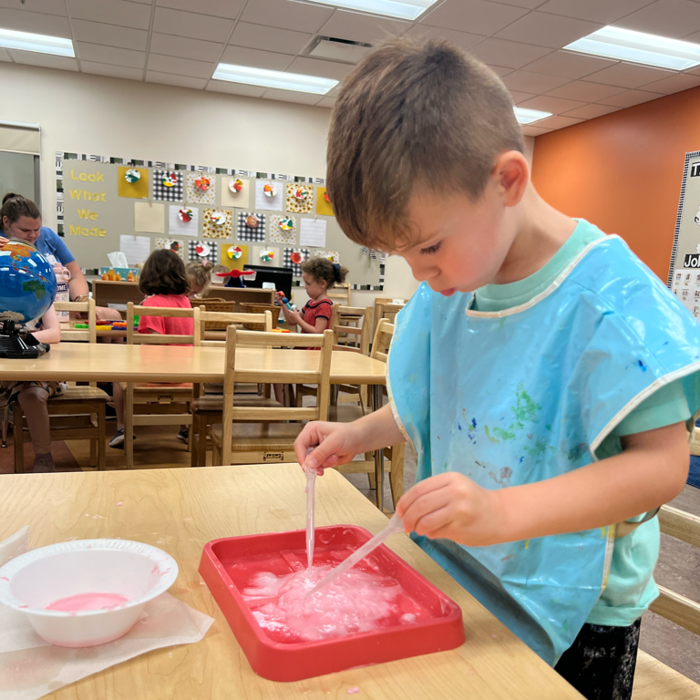 Boy playing with slime
