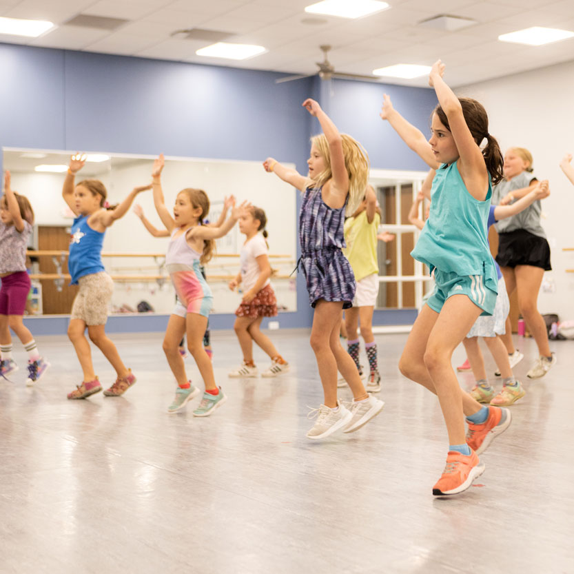A group of girls dancing