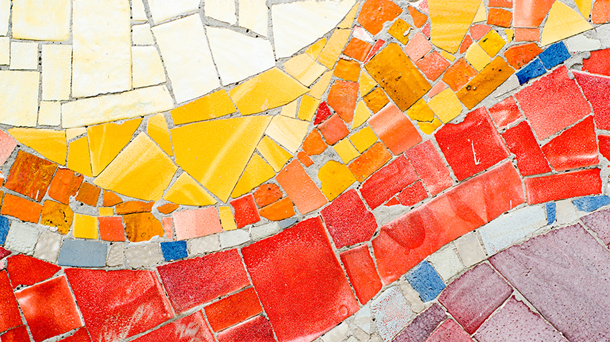 Colorful glass arranged in wavy lines