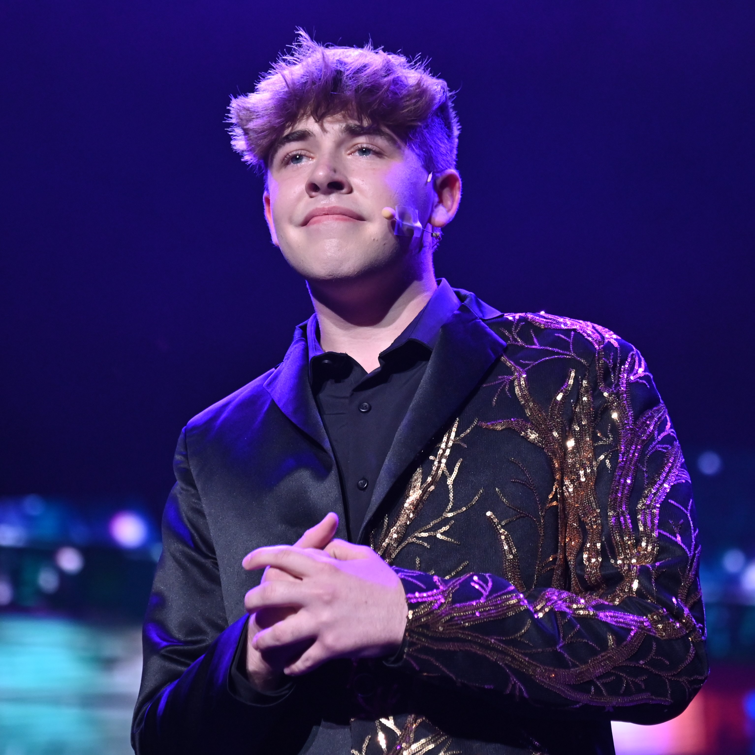 Brett looking at the audience after singing