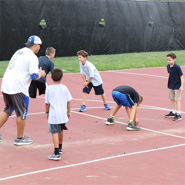 Kids playing flag football.