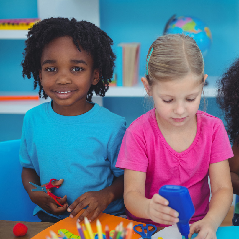 Little boy and girl making art