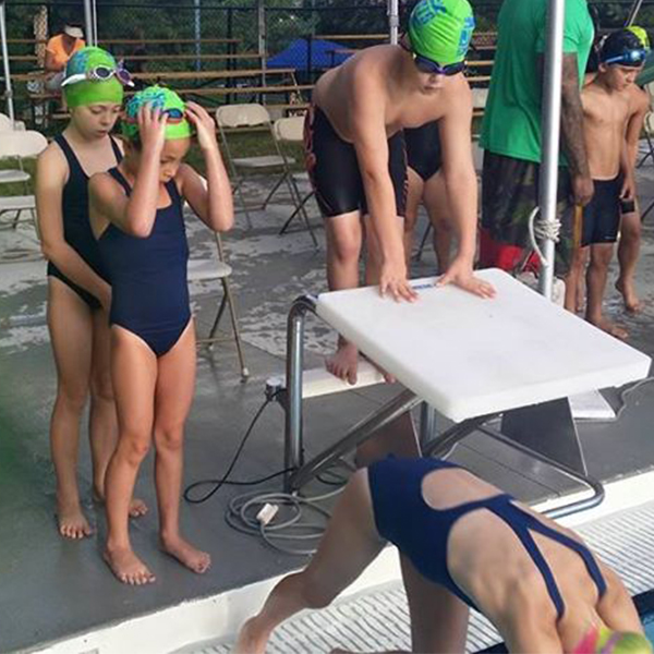 Swimmers lined up at the start