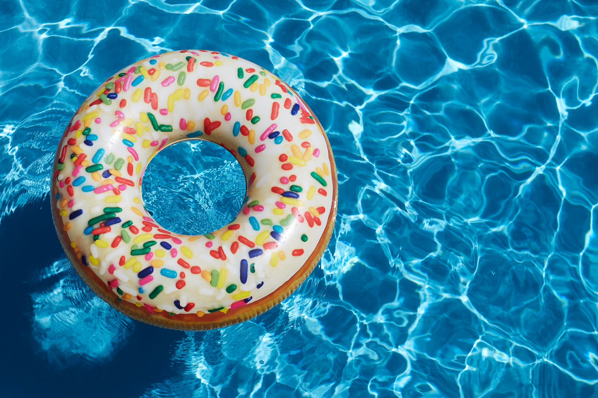 Innertube designed like a donut in a pool