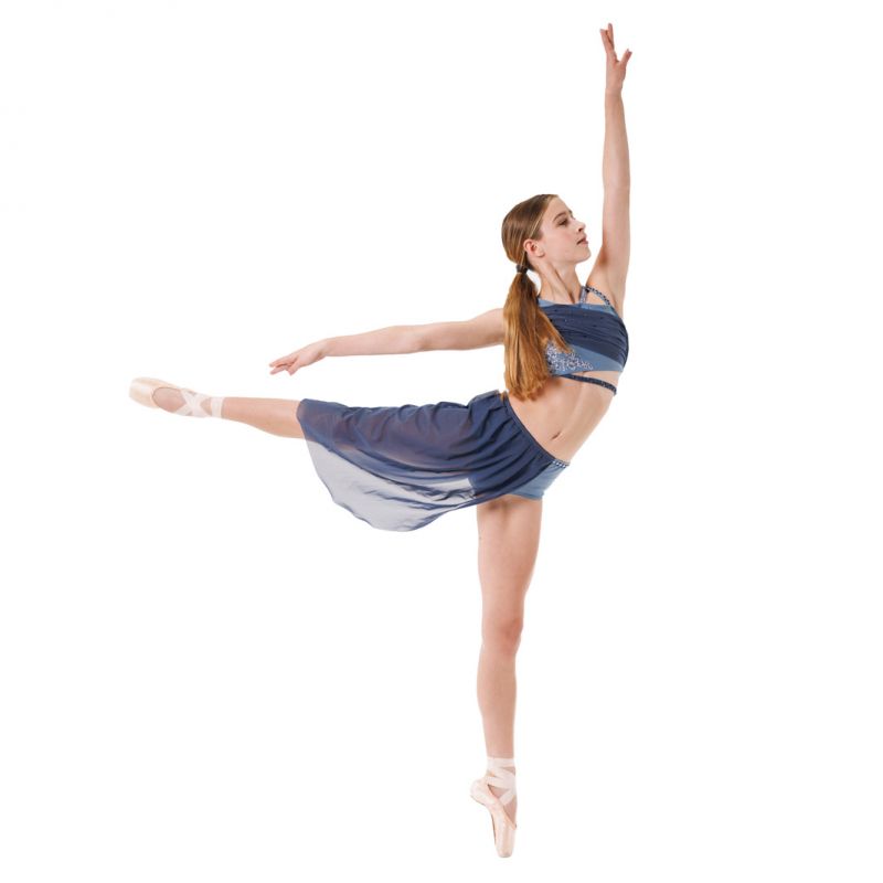 Encore dancer in purple leotard and skirt performing an arabesque