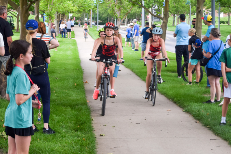 Kids riding bikes during the Youth Triathlon