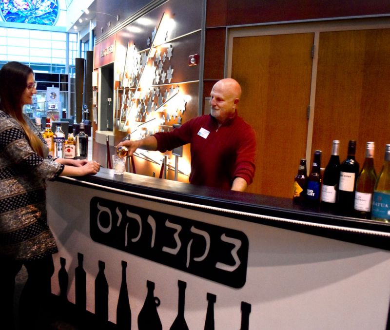 Guest being served at the theatre concession stand